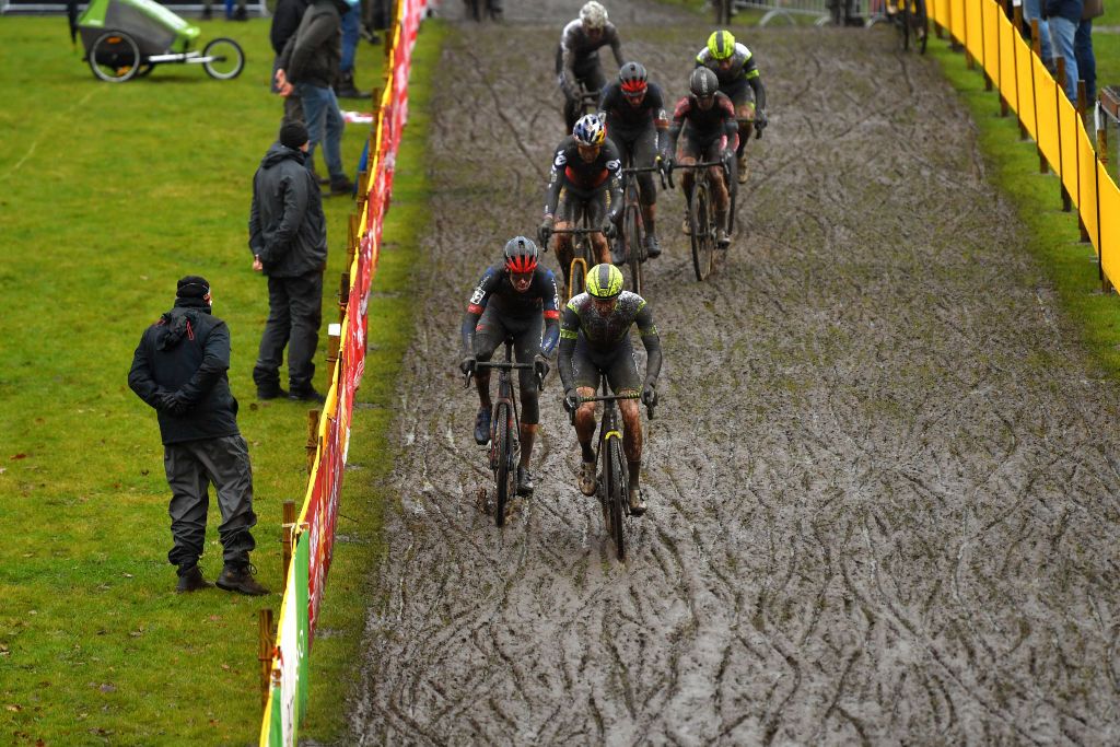 BOOM BELGIUM DECEMBER 04 LR Pim Ronhaar of The Netherlands and Team Baloise Trek Lions and Quinten Hermans of Belgium and TormansCircus Cyclo Cross Team during the 7th Superprestige Cyclocross Boom 2021 Mens Elite SPBoom Superprestige2022 on December 04 2021 in Boom Belgium Photo by Luc ClaessenGetty Images