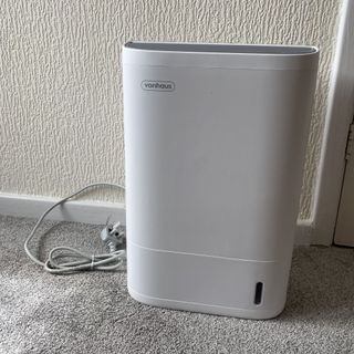 Vonhaus white dehumidifier on grey carpet