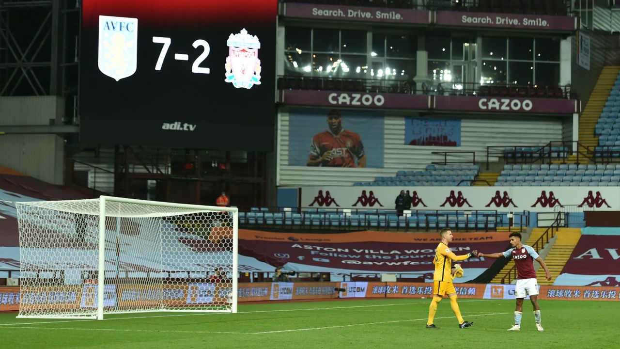 Liverpool goalkeeper Adrian bumps fists with Aston Villa hat-trick hero Ollie Watkins 