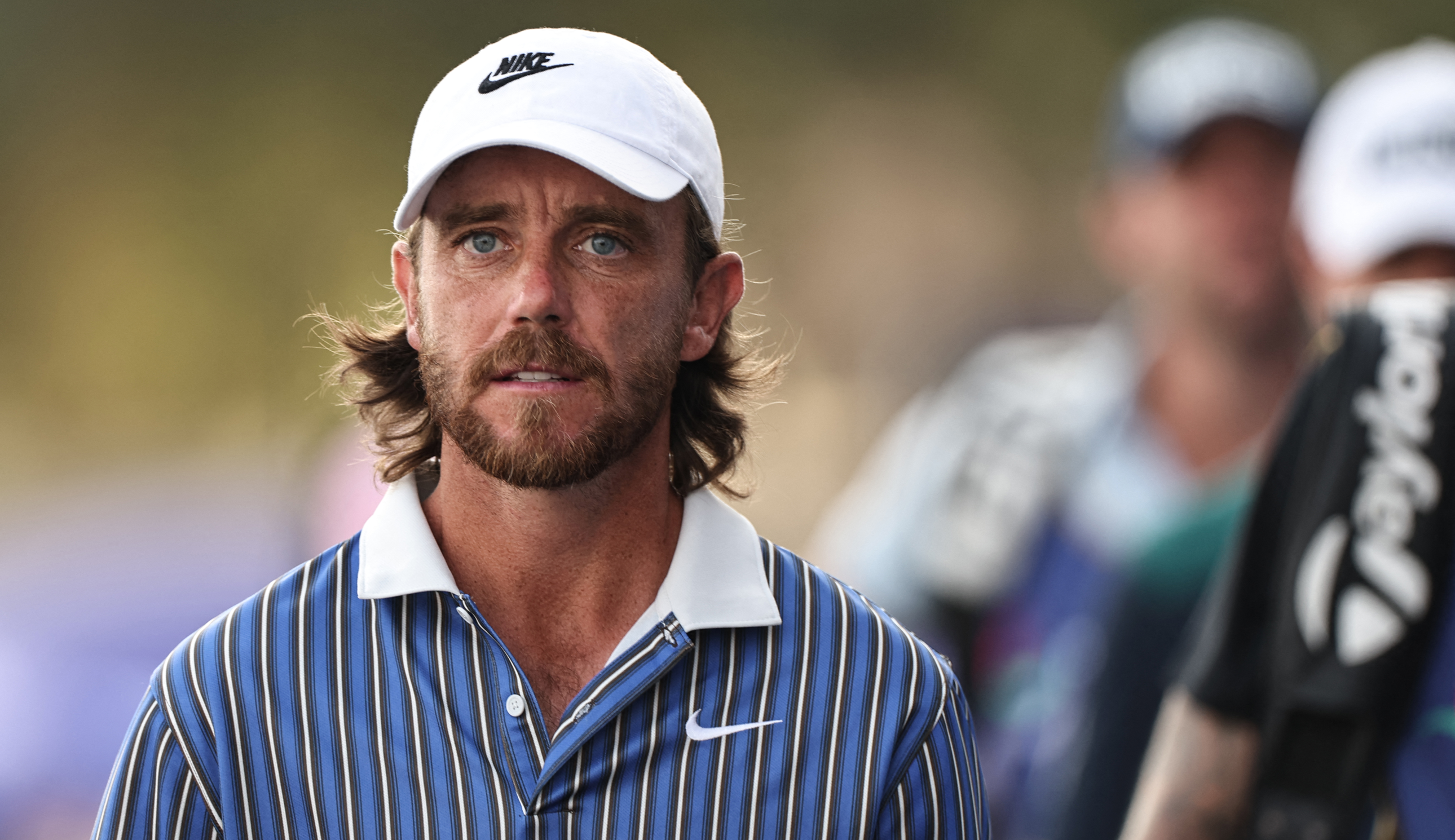 Tommy Fleetwood walks off the tee box