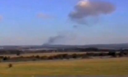 A local Pennsylvania man recorded this newly released footage of smoke rising from the crash site of United Airline Flight 93 on Sept. 11, 2001.