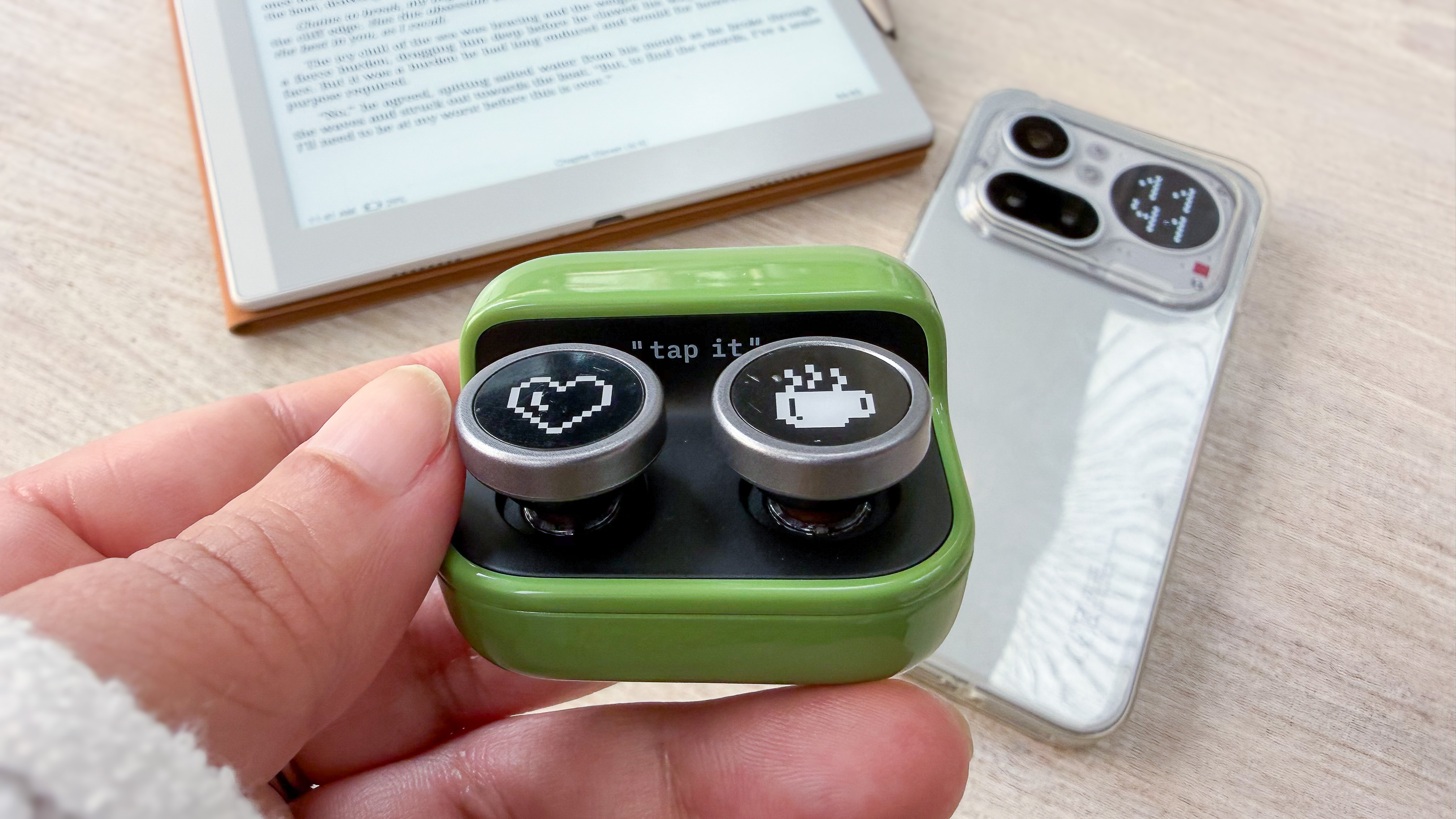 Boox Tappy ereader page turner in a person's hand