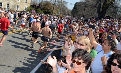 Runners head out at the start of the 116th Boston Marathon on April 16, 2012.