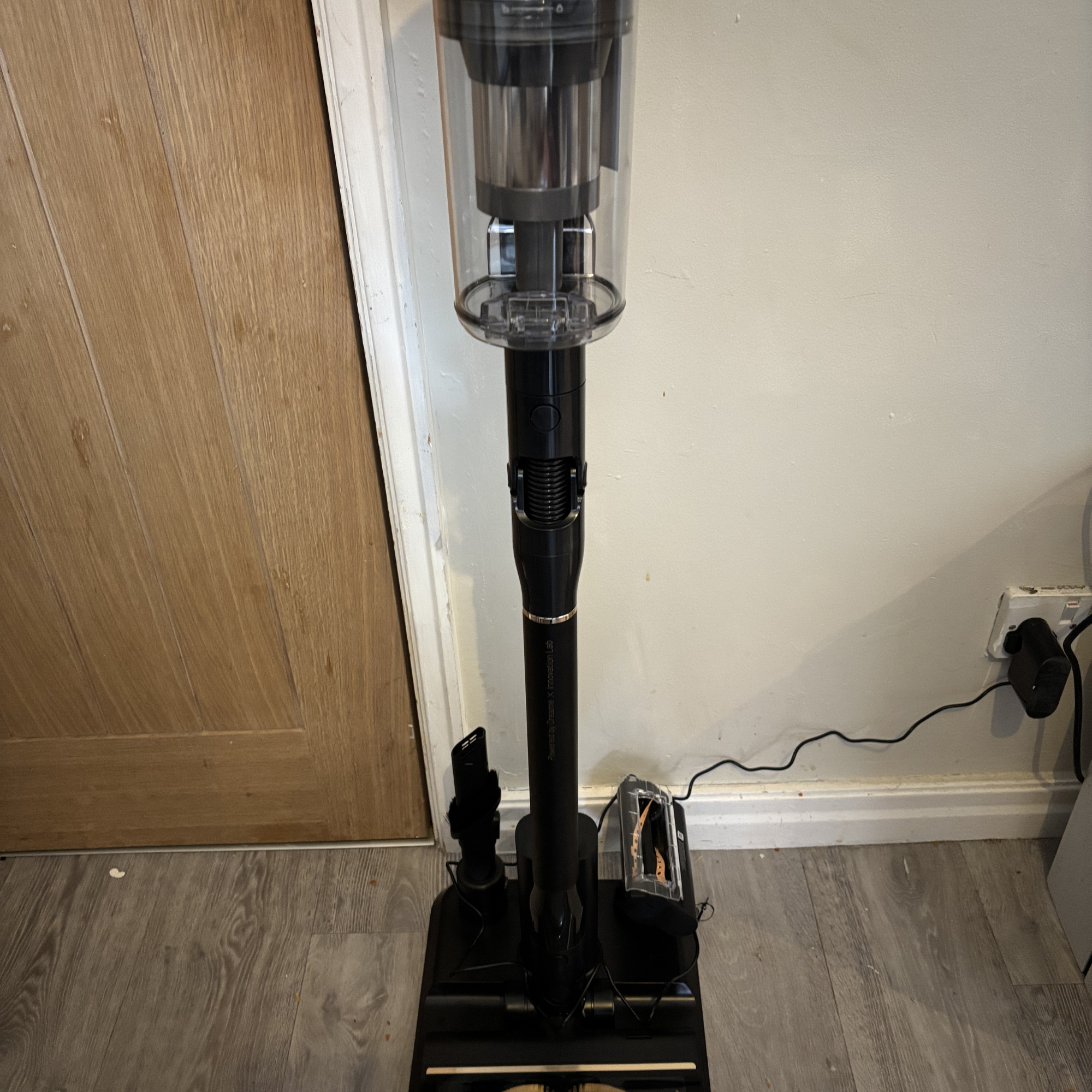 Dreame V20 Pro Cordless Stick Vacuum positioned on charging dock