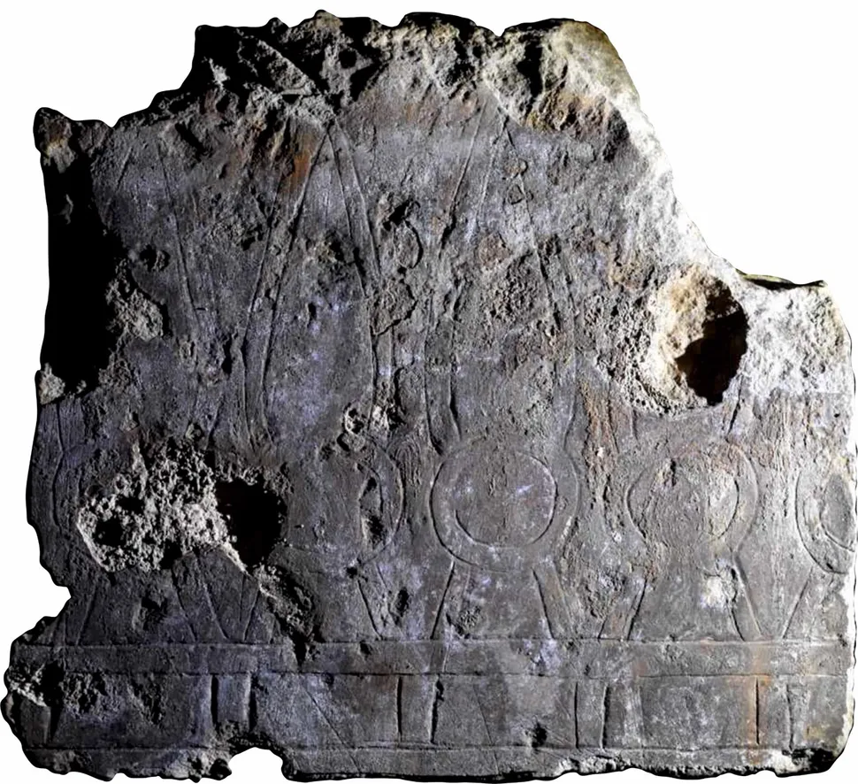 A stone ⁢relief from the ancient ⁣Egyptian​ city of Imet.