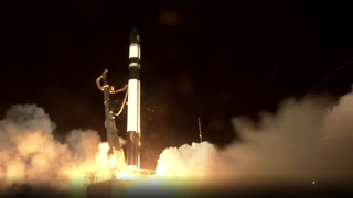 A Rocket Lab electron rocket launches into the night sky over Mahia Peninsula, New Zealand on Oct. 14, 2025.
