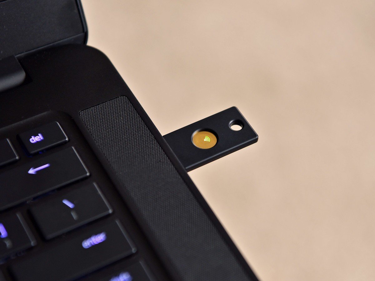 Picture of a YubiKey plugged into a laptop.