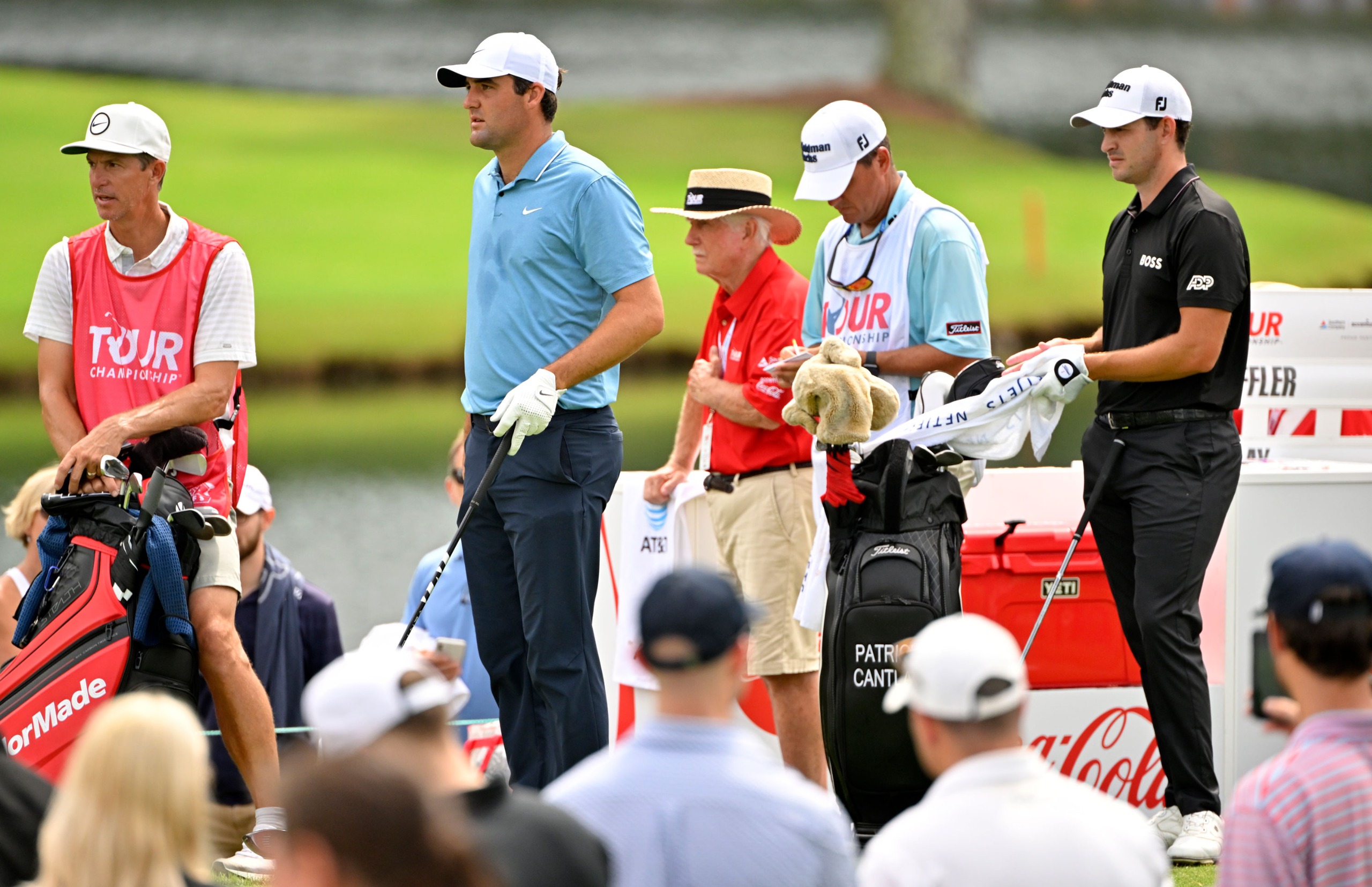 Scottie Scheffler waits to play a shot