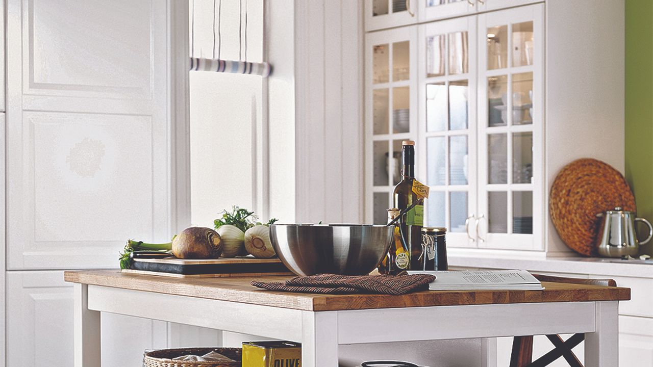 A white IKEA kitchen with an island