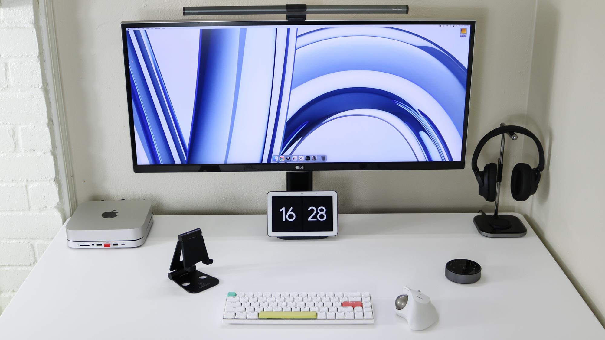 An overhead view of a desk setup built around a Mac mini M2