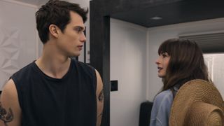 Nicholas Galitzine and Anne Hathaway looking at each other in The Idea of You