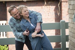 Kylie and Jason hug on Ramsay Street as Neighbours icons Scott and Charlene 