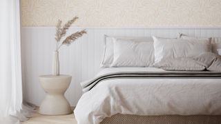 white bedroom with wood panelling headboard