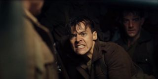 Dunkirk Harry Styles threatens someone with a gun