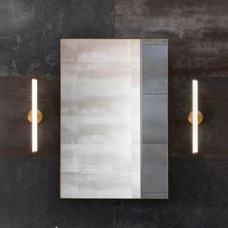 slim linear wall lights next to bathroom mirror