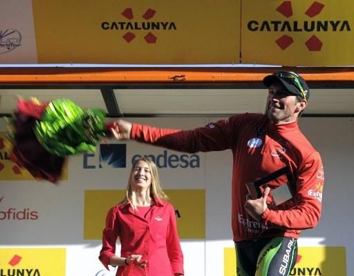 Michael Albasini (GreenEdge) tosses his bouquet into the crowd