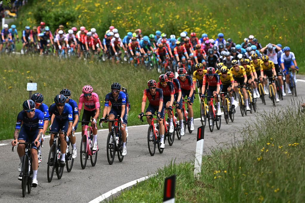 BERGAMO ITALY MAY 21 LR Bruno Armirail of France Pink Leader Jersey Thibaut Pinot of France and Team Groupama FDJ Salvatore Puccio of Italy and Team INEOS Grenadiers and a general view of the peloton competing during the 106th Giro dItalia 2023 Stage 15 a 195km stage from Seregno to Bergamo UCIWT on May 21 2023 in Bergamo Italy Photo by Tim de WaeleGetty Images