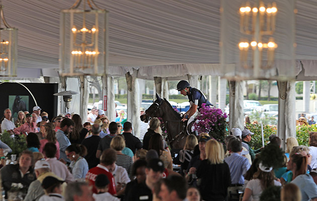 Tim Price on Nouvelle riding through the Global Dressage Festival VIP pavilion.