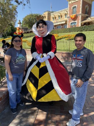 Christine and Robert at Disneyland with Queen of Hearts
