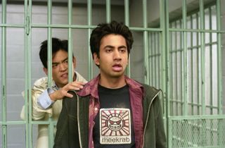 (L, R) John Cho as Harold, trying to touch Kal Penn as Kumar, on the shoulder in Harold & Kumar Go to White Castle