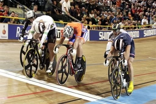 Australian Shane Perkins edges out Mickael Bourgain (R, France) and Teun Mulder (C, Netherlands) to win round two of the men's keirin