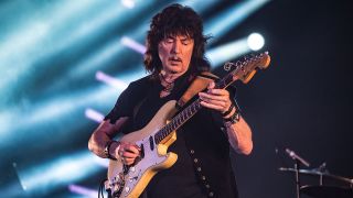 A photo of Ritchie Blackmore on stage with Rainbow in 2016