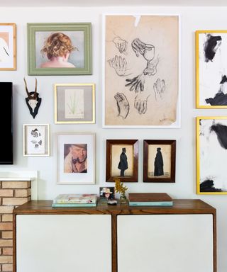 A gallery wall with bright pictures