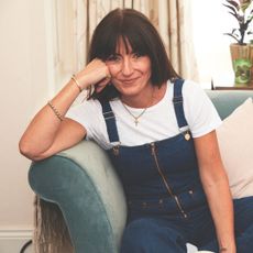 Davina McCall sat on a sofa