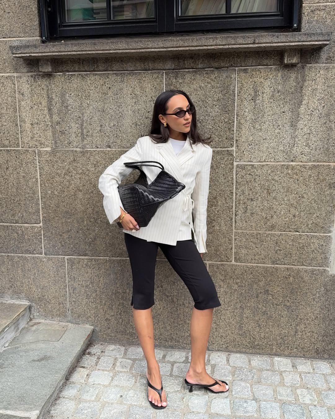 Ingrid in a linen pinstripe blazer and capri leggings