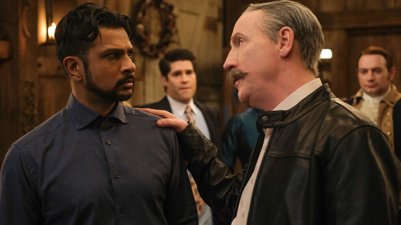 Pictured (L-R): Utkarsh Ambudkar as Jay looking scared and Matt Walsh as Elias Woodstone putting his hand on Jay&#039;s left shoulder while talking to him. 
