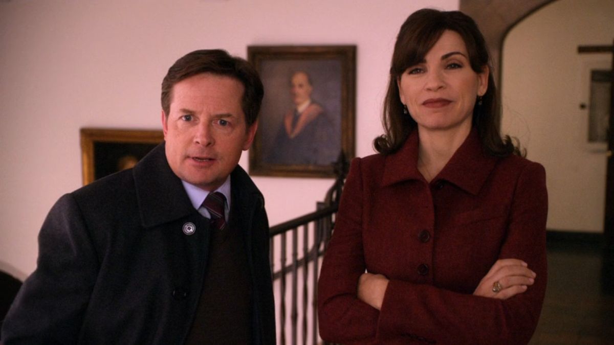 From left to right: Michael J. Fox and Julianna Margulies standing next to each other. 