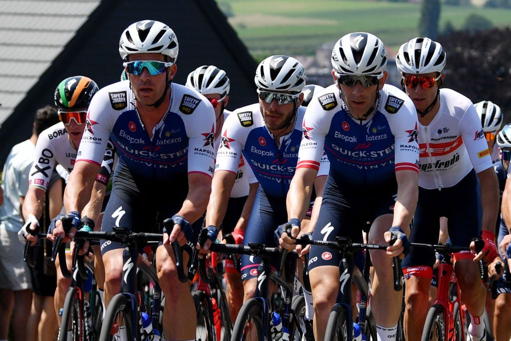 MAARKEDAL BELGIUM JUNE 15 LR Iljo Keisse of Belgium Florian Senechal of France and Michael Morkov of Denmark and Team QuickStep Alpha Vinyl compete during the 91st Baloise Belgium Tour 2022 Stage 1 a 165km stage from Merelbeke to Merelbeke BaloiseBelgiumTour on June 15 2022 in Maarkedal Belgium Photo by Luc ClaessenGetty Images