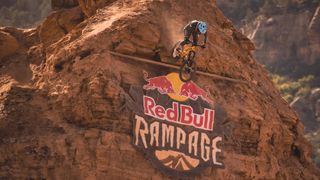Brett Rheeder riding off a massive jump at Red Bull Rampage 2022