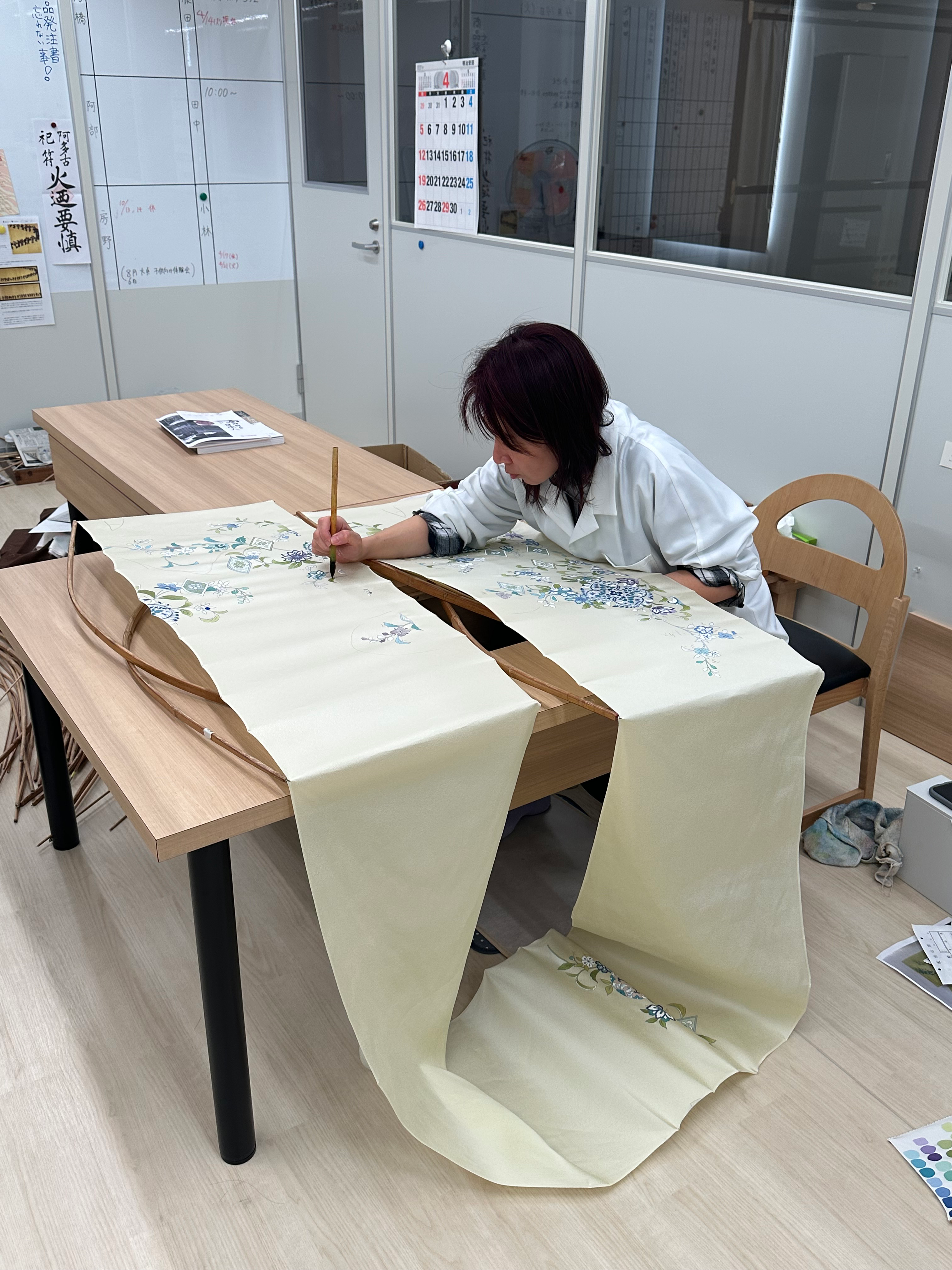Artist creating illustrations at Japanese kimono house Chiso