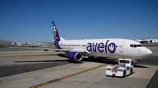 An Avelo Airlines flight is seen on the tarmac at Hollywood Burbank International Airport in Burbank, California.
