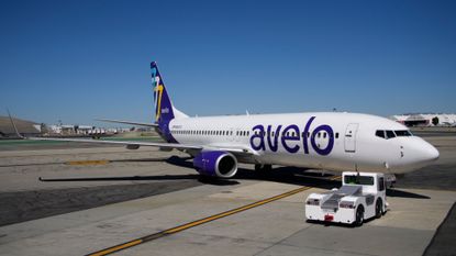 An Avelo Airlines flight is seen on the tarmac at Hollywood Burbank International Airport in Burbank, California.