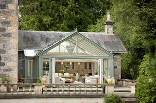 a large conservatory on a traditional home