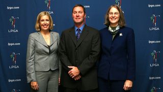 Mike Whan is announced as the new commissioner of the LPGA and poses for a photo with LPGA directors Dawn Hudson and Leslie Greis