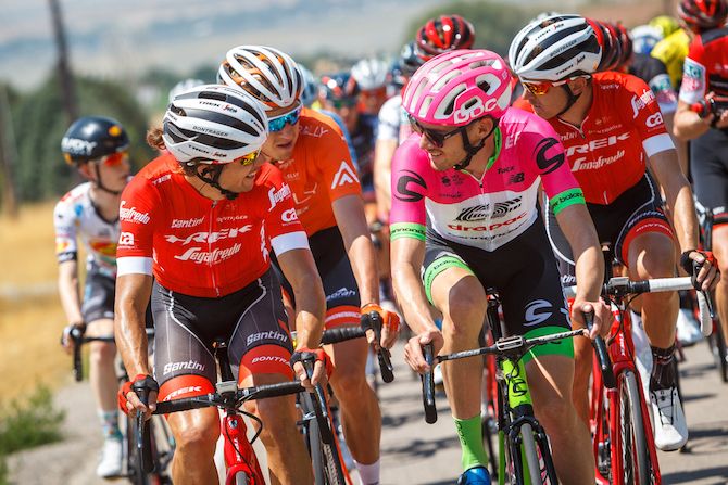 Kiel Reijnen (Trek-Segafredo) has a chat with Alex Howes (EF Education First - Drapac) on the front of the peloton on August 8, 2018 in Cedar City, Utah.