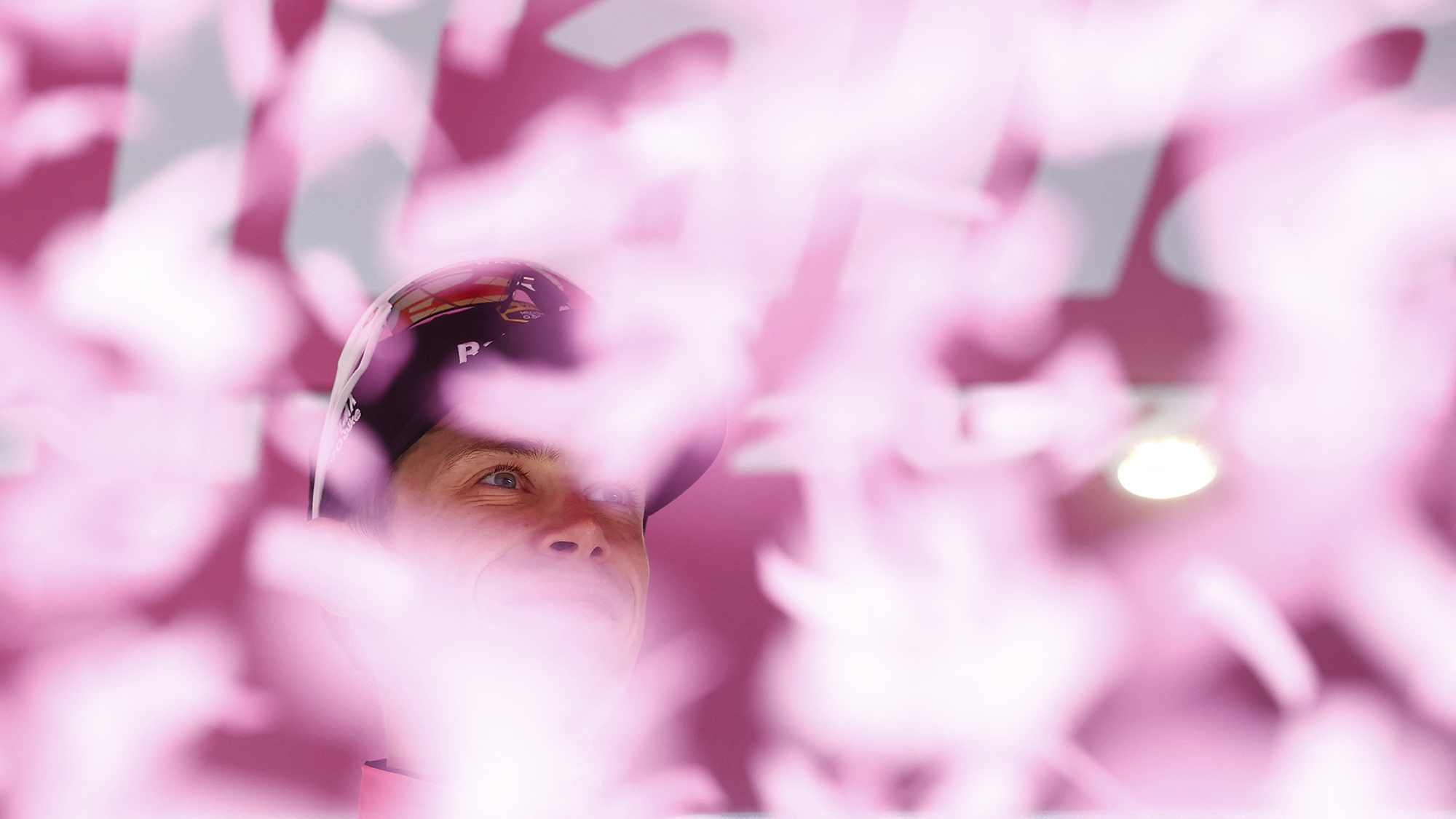 Danish cyclist Jonas Vingegaard of Team Visma–Lease a Bike is showered in confetti after the 17th stage of the Giro d'Italia 2026 cycling race in Andalo, Italy