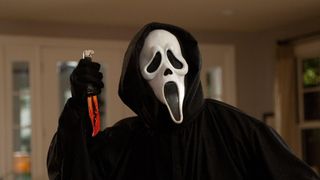 The Ghostface killer holds a bloody knight in the first Scream movie