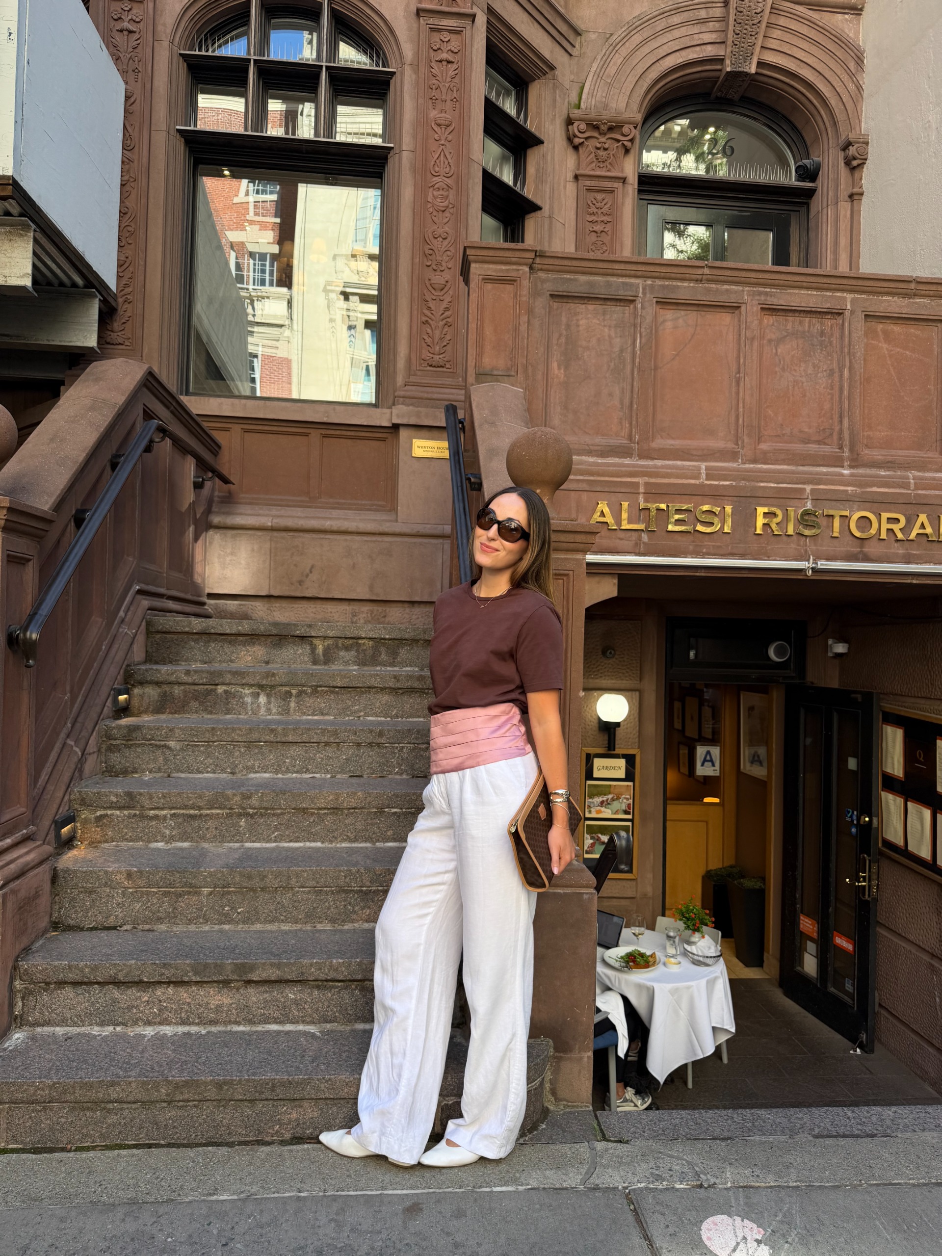 Senior fashion editor Anna LaPlaca wearing the cummerbund trend for fall 2026.