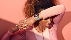 best smartwatch: fit young woman wearing the Google Pixel Watch 2