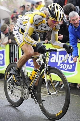 Edvald Boasson Hagen (Columbia-Highroad) powers through the final kilometres of a wet and cold Gent-Wevelgem.