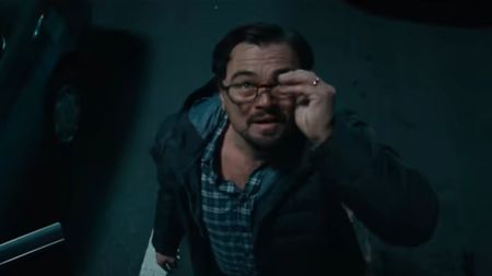 Leonardo DiCaprio staring up with glasses in Don't Look Up