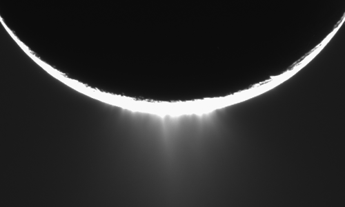This image shows geysers erupting out of the surface of Saturn's moon Enceladus.