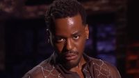 Ncuti Gatwa looks at the camera during his monologue on SNL UK