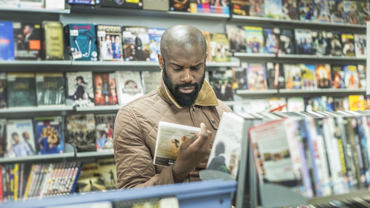 Man shopping for DVDs