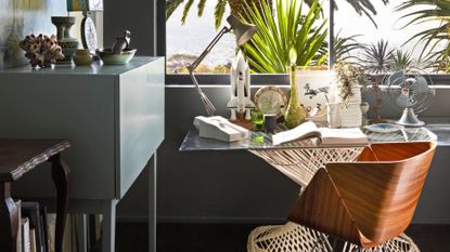 Modern home office with picture window and view over beach