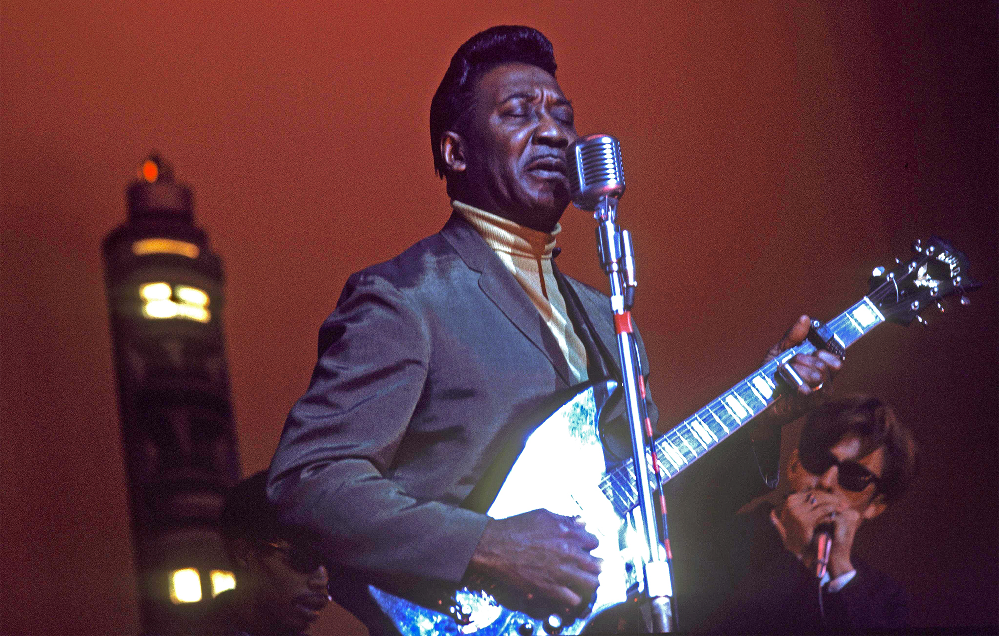 American blues singer and guitarist Muddy Waters (1913-1983) performs live on stage at the Hammersmith Odeon in London in 1969.